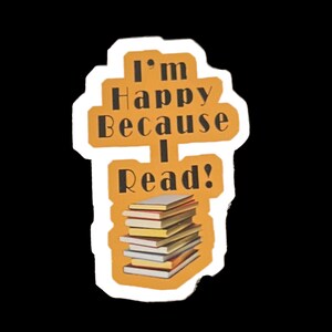 May include: A yellow sticker with the text "I'm Happy Because I Read!" and a stack of books underneath.