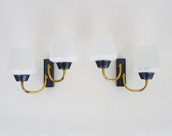 Pair of vintage Maison Arlus wall lights from the 1950s in brass, glass globe.