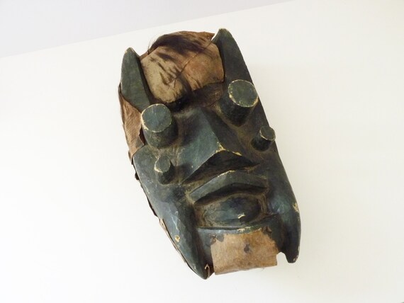 Old African wooden ceremony mask. Grebo Mask, Ivory Coast