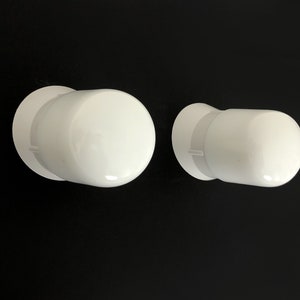 Pair of white oblique wall lights by Arno