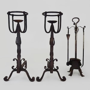 Pair of wrought iron firedogs with antique 19th century fireplace tools