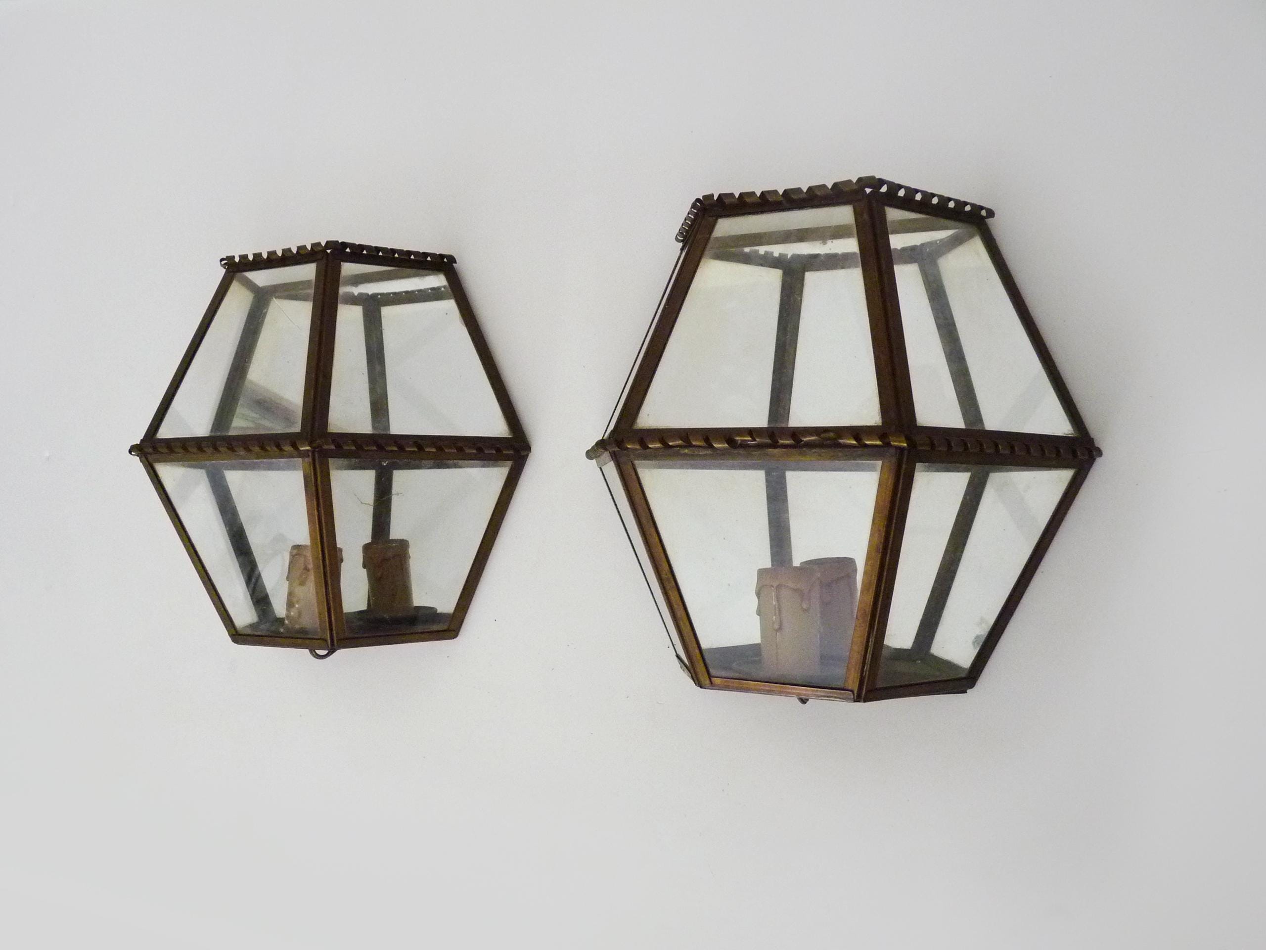 Pair of Louis XIII brass and glass wall sconces. 1960s