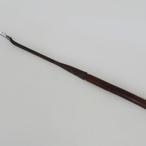 Old tree frog for horses, hoof cure, hoof scraper. Primitive tool