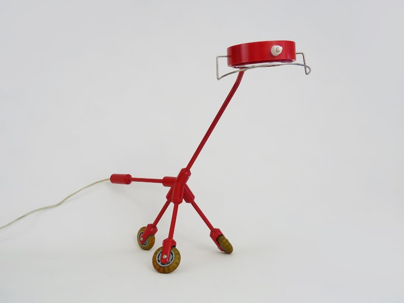 Harry Allen tripod shops lamp on wheels Kila Lamp model for Ikea, 2001