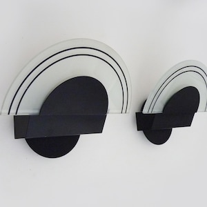 Pair of vintage Italian design wall sconces in metal and semicircular glass. Memphis Milano style, 1980s