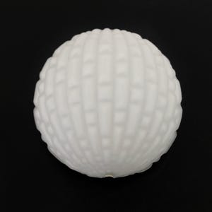 Vintage half sphere wall light in white glass. 70s