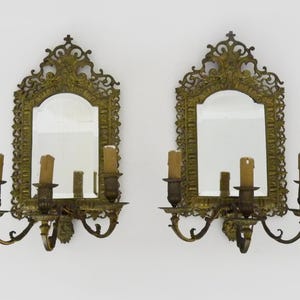 Pair of 3-light beveled mirror wall sconces in Napoleon III style, 19th century.