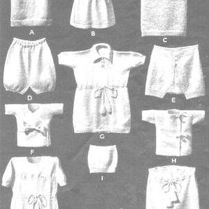 May include: A collection of white knitted baby clothes, including a tank top, dress, shirt, shorts, and a jumpsuit. The garments feature various designs, such as bows and button closures. The image showcases a variety of styles for infants.