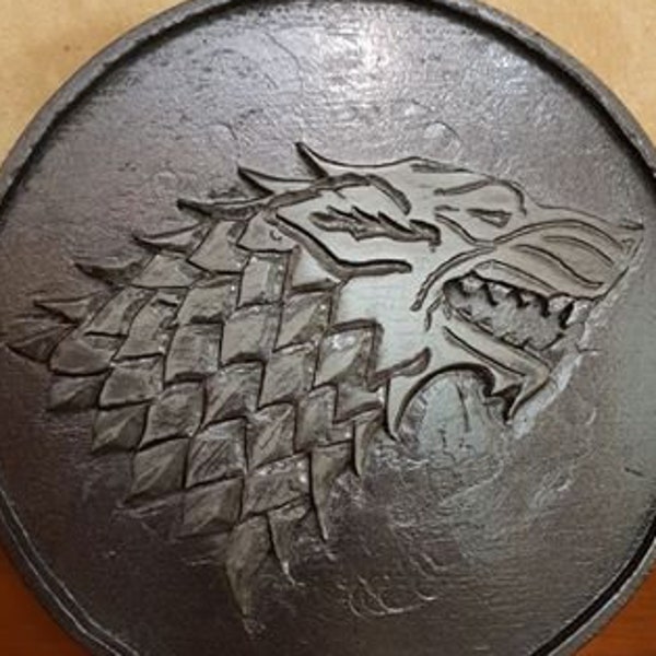 Insegna da Pub raffigurante l'emblema di Casa Stark