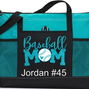 May include: Teal and black tote bag with a mesh pocket. The front pocket has a glittery teal design that says "Baseball Mom" with a baseball and heart. The bottom of the pocket has white text that says "Jordan #45".