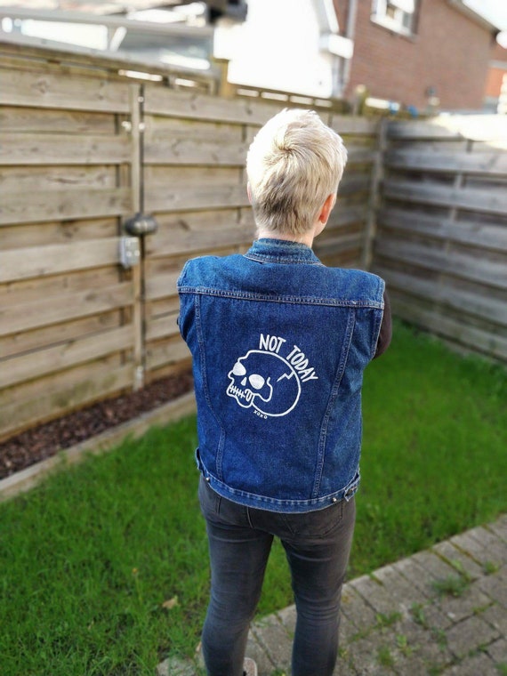 denim jacket with print on the back