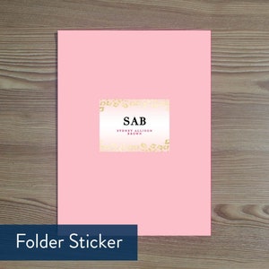 May include: Pink folder sticker with a gold leopard print border. The sticker says "SAB SYDNEY ALLISON BROWN" in black text.