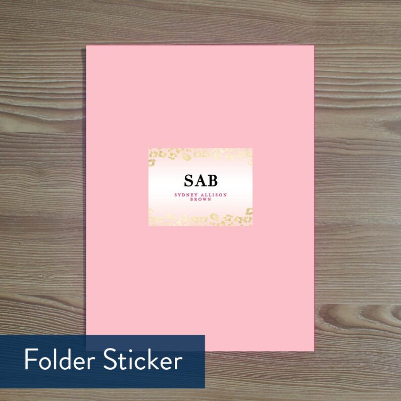 May include: Pink folder sticker with a gold leopard print border. The sticker says "SAB SYDNEY ALLISON BROWN" in black text.
