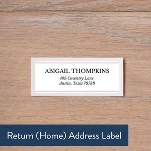 May include: White return address label with pink and blue borders. The text reads "ABIGAIL THOMPKINS, 405 Coventry Lane, Austin, Texas 78738". Below the label is a blue bar with the text "Return (Home) Address Label".