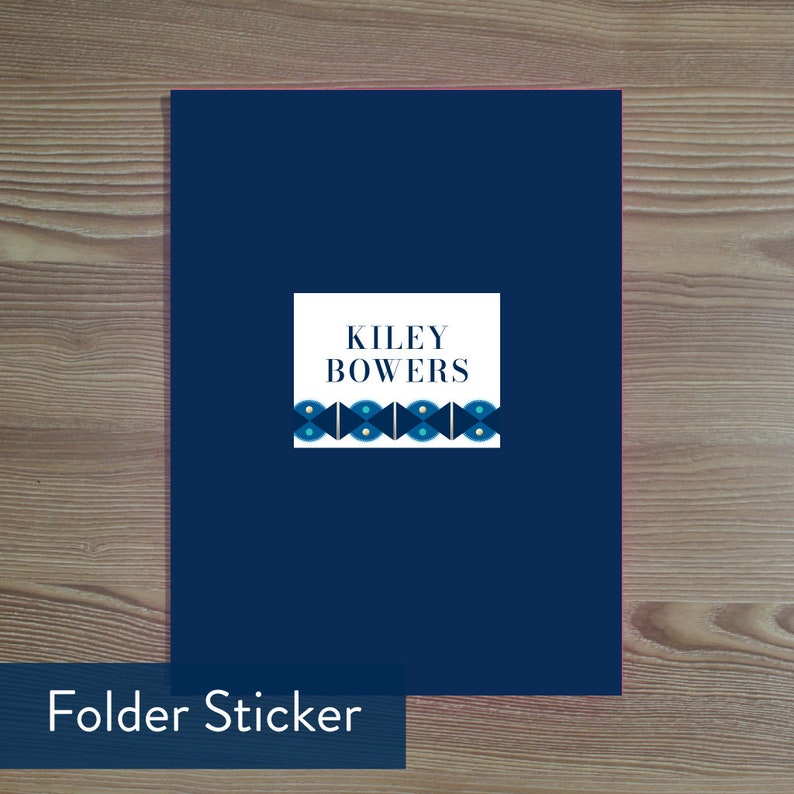 May include: A navy blue folder sticker with a white label that says "Kiley Bowers". The label has a blue and gold geometric design.