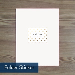 May include: White folder sticker with gold polka dots and the text "ashton HARPER BRADLEY" in black.