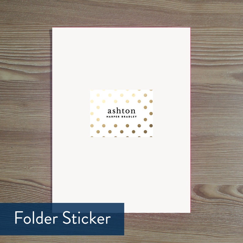 May include: White folder sticker with gold polka dots and the text "ashton HARPER BRADLEY" in black.