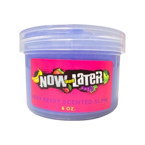 May include: A purple plastic container of Now and Later Very Berry Scented Slime. The container is labeled with a pink and white logo and the text "6 oz."