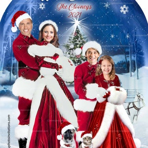 May include: A Christmas card featuring a family of four dressed in red and white Santa outfits, with a dog and cat wearing Santa hats. The card has a blue background with snowflakes and the text "We're Dreaming of a White Christmas The Clooneys 2021".