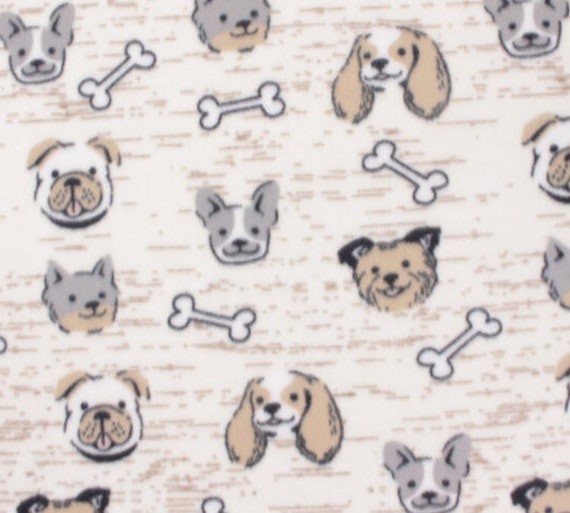 Tan Dogs Faces Fleece Fabric is 58