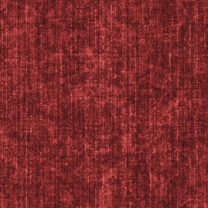May include: A close-up of a red fabric with a textured, woven pattern. The fabric has a slightly distressed look, with some areas appearing faded or worn.