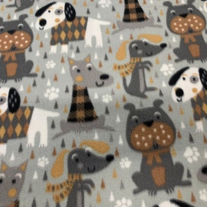 Sweater Dogs Fleece Fabric is 58" - 60" wide and 100% fleece  fleece for dog blankets dog throws fleece for tie blankets