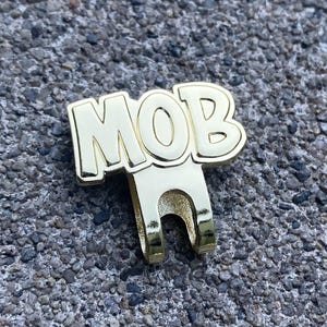 MOB Clip/Blip (gold) for (hats, hat brim, bags, vest, jackets, beanies, lanyards, etc.)