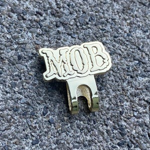 MOB Clip/Blip (gold) for (hats, hat brim, bags, vest, jackets, beanies, lanyards, etc.)