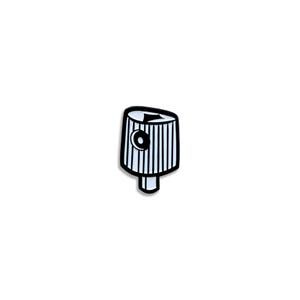 May include: A black and white spray paint can nozzle. The nozzle is white with vertical black lines and a black circle with a white dot. The nozzle has a black outline and a small black stem.