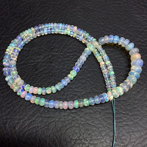 Wholesale Opal 10 Strand Ethiopian Opal Smooth Rondelle Beads Wello Opal Fire Beads High Luster Opal Gemstone Beads 3-4.MM 16&quot; Strand