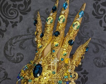 Eine Hand (Handrüstungsschmuck) und 5 voll bewegliche Fingerrüstungsringe mit Krallen: religiöses Thema der Jungfrau mit dem Kind!