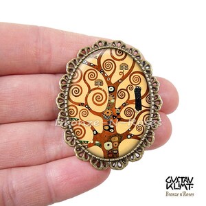 Broche épingle Portrait d'Adèle cabochon métal argenté tableau Gustav Klimt art ARBRE ORANGE