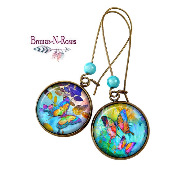 Boucles d'oreilles " Papillon magique " cabochon bleu bronze bijou fantaisie cadeau