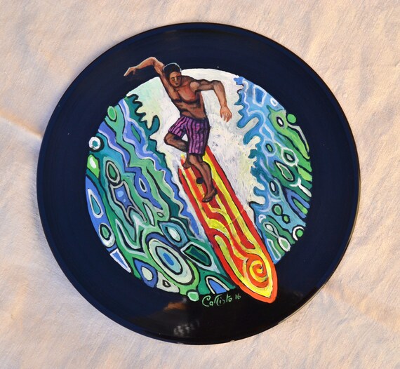 Sun and wave painted on record