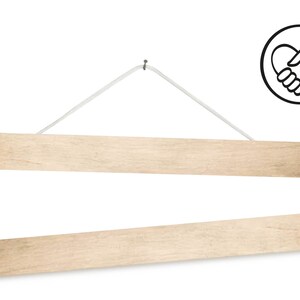 May include: Two wooden hanging shelves with a white string attached to a hook. The top shelf is 31 inches long.
