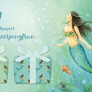 May include: Two gift boxes wrapped in blue and green mermaid-themed wrapping paper. The boxes are tied with white ribbon. A mermaid with long brown hair swims in the background. The text "NEW! Geschenkpapier Meerjungfrau" is written on the top of the image.