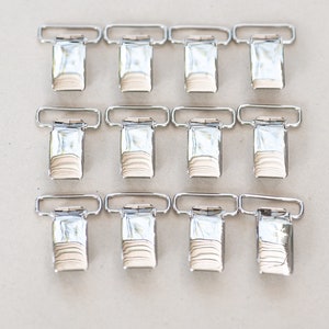 12 Stück Hosenträgerclips, glänzende Stahl Hosenträgerclips, silberne Ausweisclips, Gürtelclips, Strumpfhalterclips.