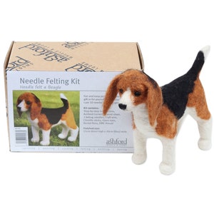 May include: Needle felting kit to make a beagle dog. The kit includes wool, needles, eyes, and instructions. The finished beagle will be 6 inches tall and 8 inches wide.