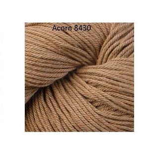 May include: Three skeins of yarn in different colors: a dusty rose color called "Dianthus 8419", a light brown color called "Acorn 8430", and a dark gray color called "Oregano 8435".