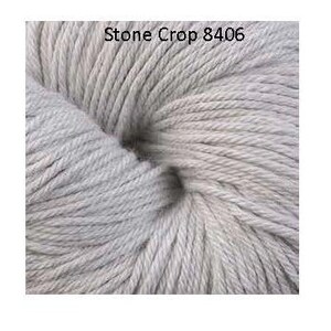 May include: Three skeins of yarn in different shades of beige. The skeins are labeled "Wisteria 8403", "Stone Crop 8406", and "Rye 8408".