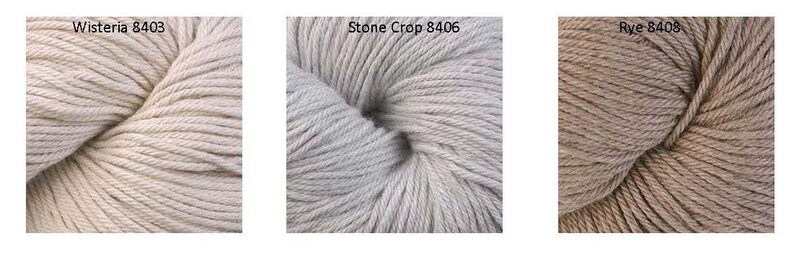 May include: Three skeins of yarn in different shades of beige. The skeins are labeled "Wisteria 8403", "Stone Crop 8406", and "Rye 8408".