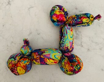 stuffed animals in balloons