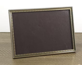 Vintage guldfärgad metallram, staffliram, mitten av århundradet