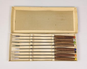 Vintage Set von Fondue Gabeln in Original Box, 8 Gabeln mit farbigen Enden
