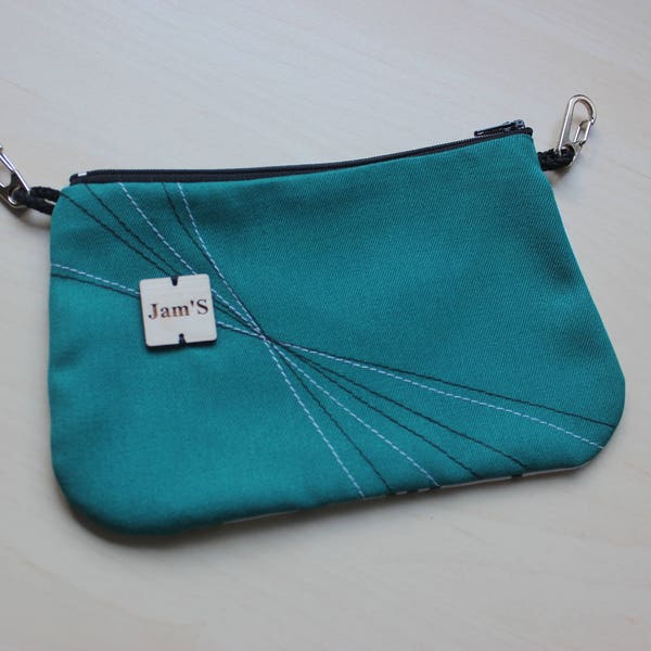 size, style banana backpack, purse, hands free, turquoise, black, light grey arrows