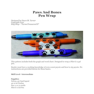 May include: Three gel pens with beaded wraps featuring paw prints. The pens are blue, orange, and purple. The beaded wraps have black and white paw prints. The text "Paws And Bones Pen Wrap" is at the top of the image.