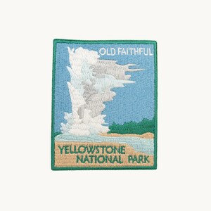 May include: A rectangular embroidered patch featuring a light blue sky, a white and grey geyser erupting, and green trees above a tan ground. The text reads OLD FAITHFUL at the top and YELLOWSTONE NATIONAL PARK at the bottom in green.