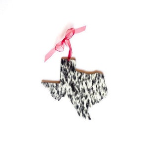 Texas Shaped that is genuine cowhide on the front and leather on the back.
