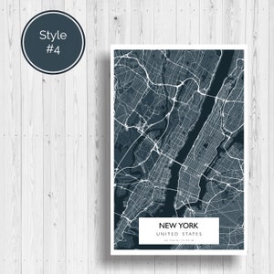 May include: A black and white map of New York City, United States. The map shows the city's streets and waterways. The text "NEW YORK" and "UNITED STATES" is printed below the map.