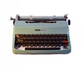 Typewriter. Vintage Olivetti Lettera 32. Blue.